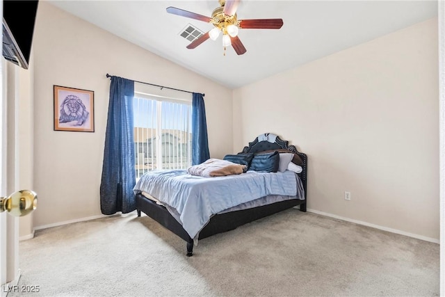 carpeted bedroom with lofted ceiling, visible vents, ceiling fan, and baseboards