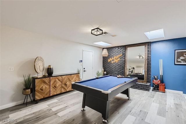 playroom with billiards, a skylight, wood finished floors, and baseboards