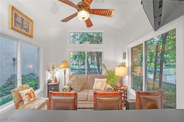 sunroom / solarium with ceiling fan