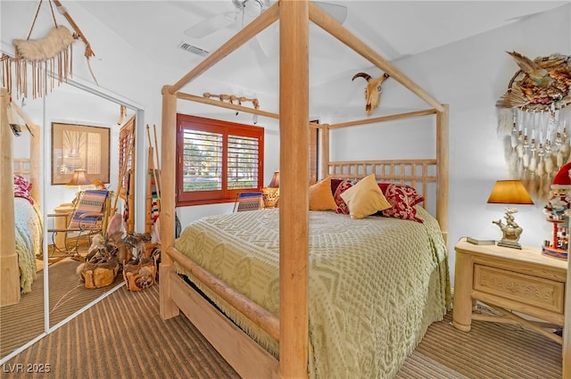 bedroom featuring carpet and visible vents