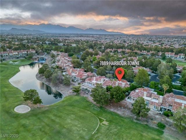 bird's eye view featuring a water and mountain view