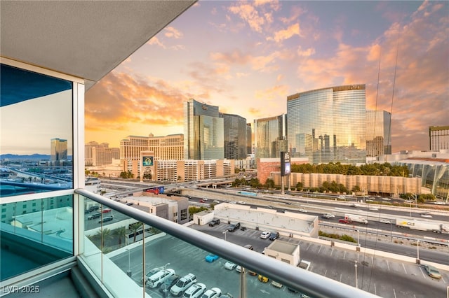 balcony at dusk with a city view