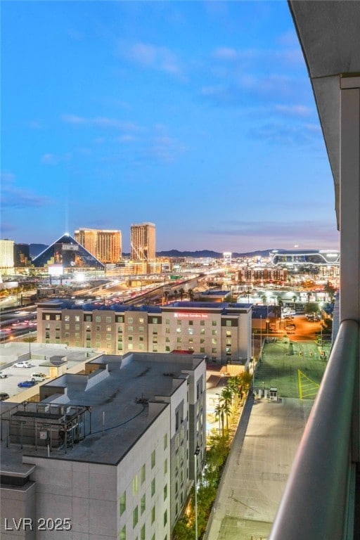 balcony featuring a view of city