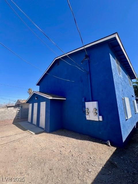 view of property exterior with stucco siding