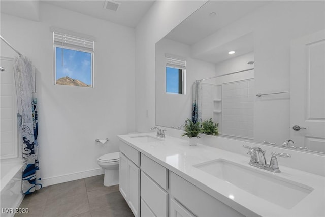 full bath featuring baseboards, a sink, toilet, and tile patterned floors