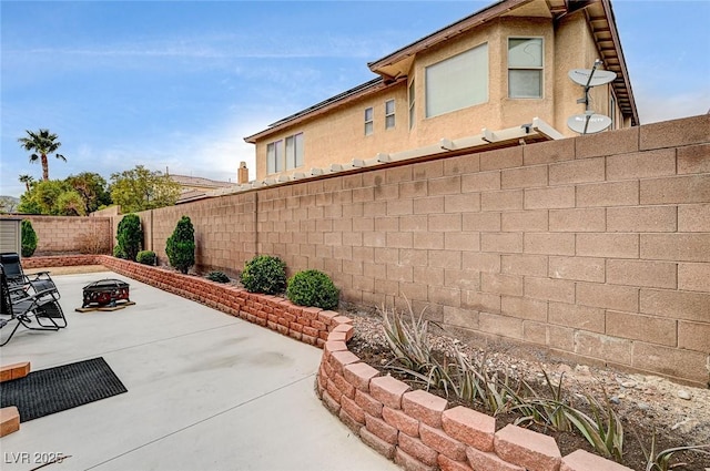 view of patio with a fenced backyard