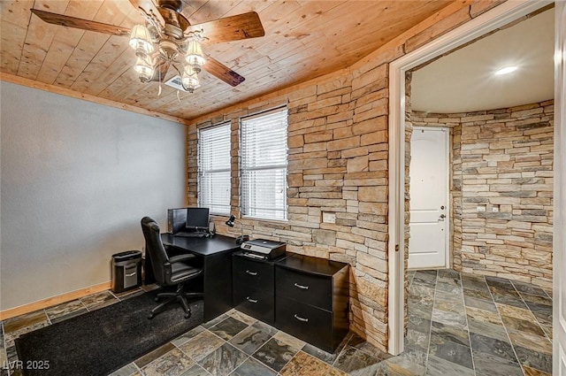 home office with ceiling fan, wood ceiling, and stone tile floors