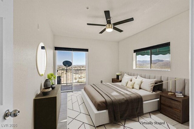 3550 Bay Sands Dr Unit 2087, Laughlin, NV 89029 - bedroom with access to outside, multiple windows, and light tile patterned floors