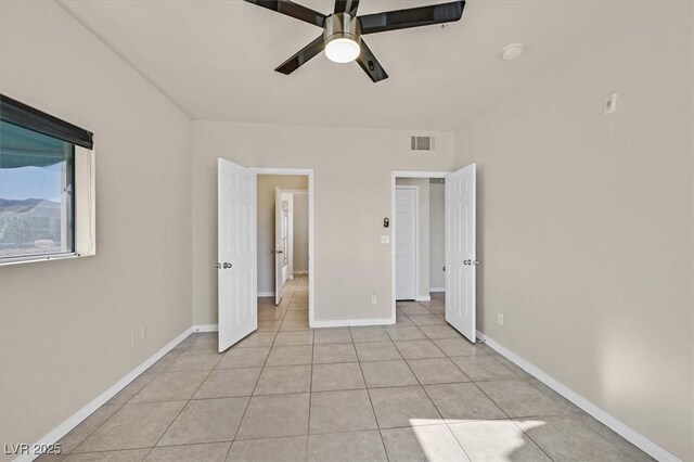3550 Bay Sands Dr Unit 2087, Laughlin, NV 89029 - unfurnished bedroom with light tile patterned floors, baseboards, and ceiling fan