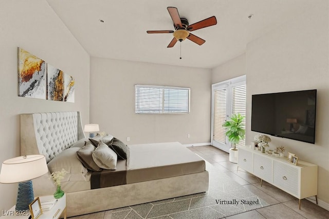 3550 Bay Sands Dr Unit 2087, Laughlin, NV 89029 - bedroom with tile patterned flooring, baseboards, and a ceiling fan