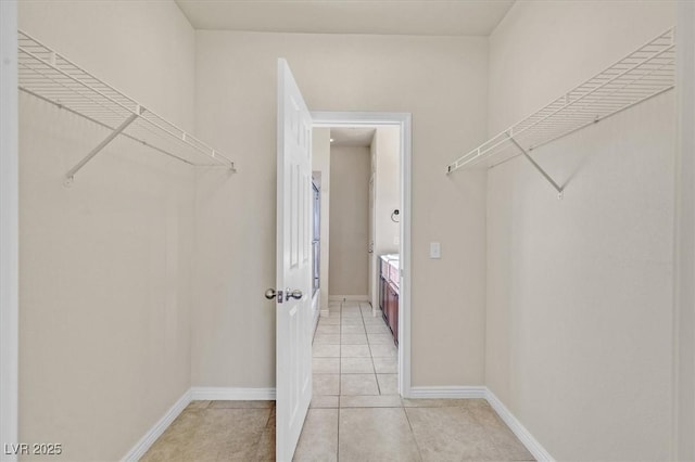 3550 Bay Sands Dr Unit 2087, Laughlin, NV 89029 - walk in closet featuring light tile patterned flooring