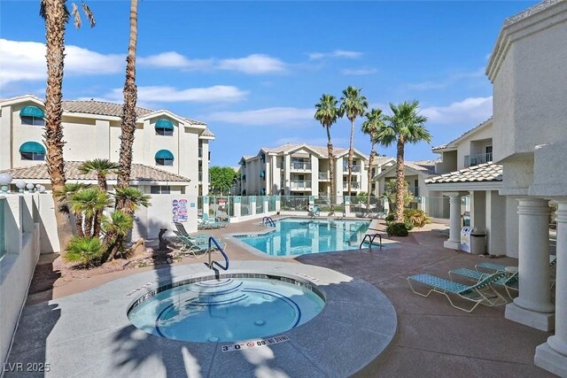 3550 Bay Sands Dr Unit 2087, Laughlin, NV 89029 - community pool featuring a community hot tub, a patio area, and a residential view