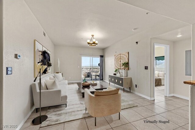 3550 Bay Sands Dr Unit 2087, Laughlin, NV 89029 - living area featuring a chandelier, light tile patterned flooring, and baseboards