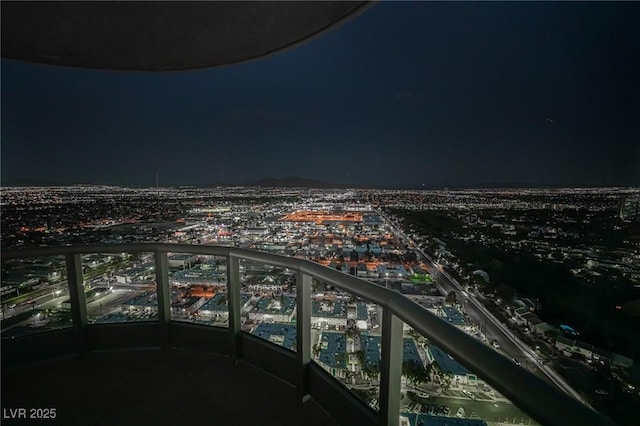 balcony with a view of city lights