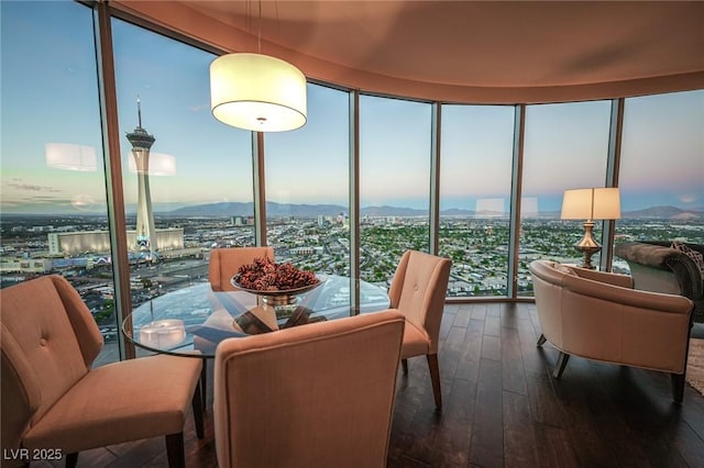 sunroom / solarium with a view of city