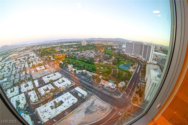 bird's eye view with a view of city and a mountain view