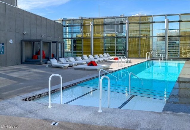 community pool with a patio