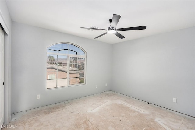 unfurnished room featuring a ceiling fan