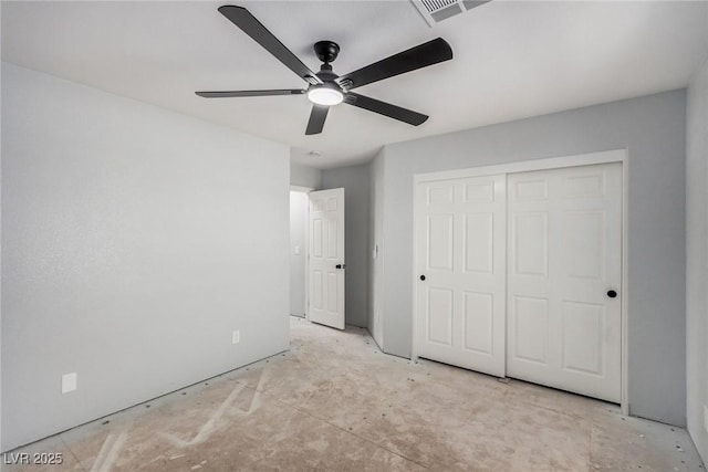 unfurnished bedroom featuring a closet, visible vents, and a ceiling fan