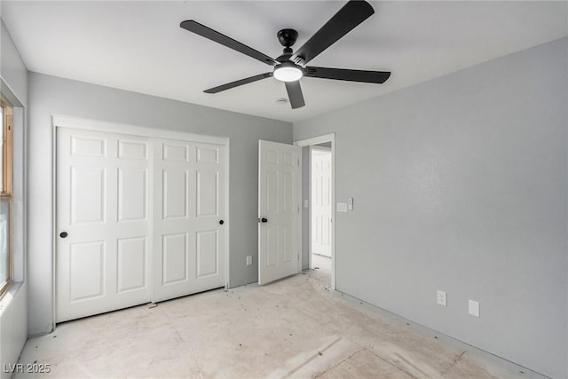 unfurnished bedroom featuring a closet and a ceiling fan