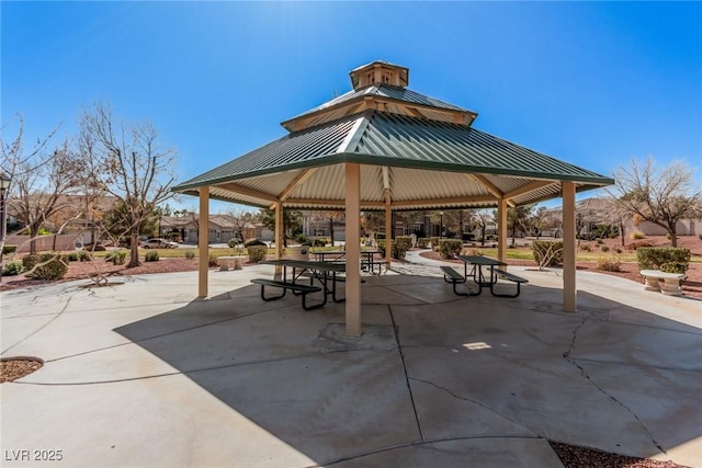 view of community with a patio and a gazebo