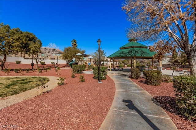 view of home's community featuring a gazebo and playground community