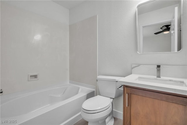 full bathroom with a washtub, vanity, and toilet