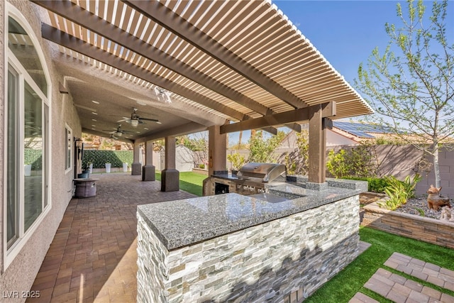 view of patio featuring ceiling fan, a fenced backyard, area for grilling, a grill, and a pergola