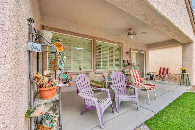 view of patio / terrace featuring a ceiling fan