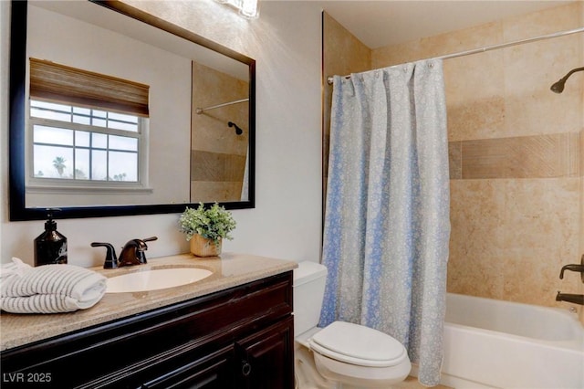 bathroom with toilet, shower / tub combo, and vanity