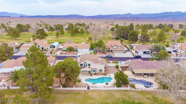 aerial view with a residential view and a mountain view