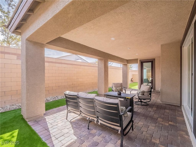 view of patio / terrace with a fenced backyard and outdoor dining area