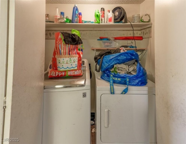 laundry area featuring laundry area and washing machine and dryer