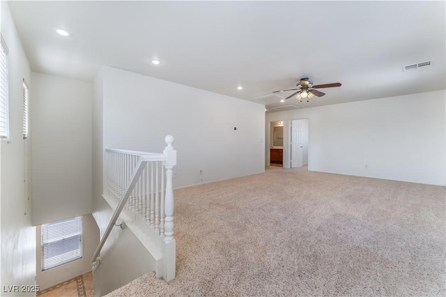 spare room featuring recessed lighting, visible vents, ceiling fan, and light colored carpet