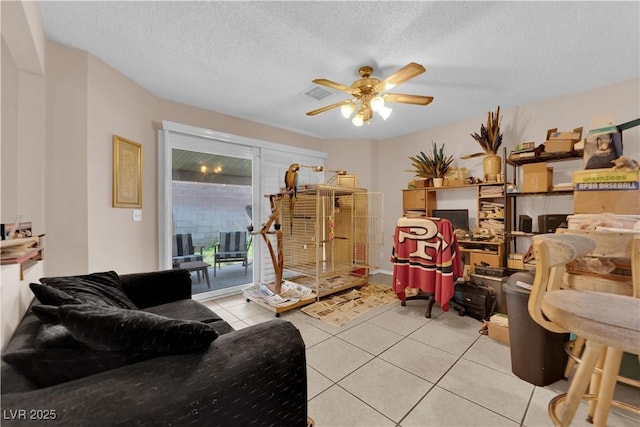 interior space with ceiling fan and visible vents