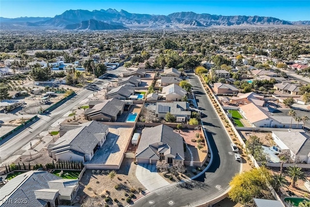 birds eye view of property featuring a residential view and a mountain view