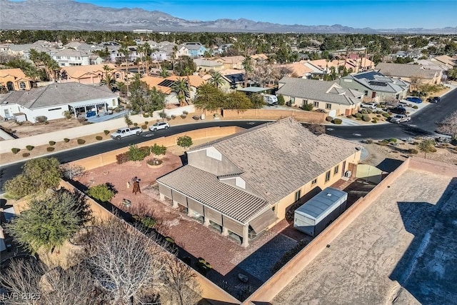 bird's eye view featuring a residential view and a mountain view