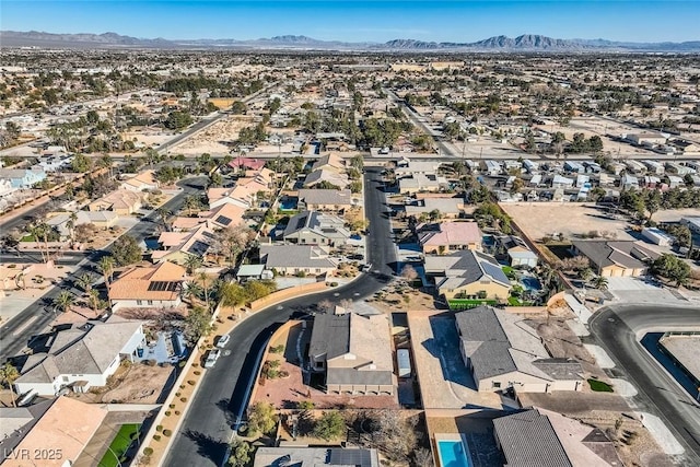 drone / aerial view with a residential view and a mountain view