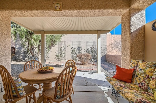 view of patio / terrace featuring outdoor dining area and a fenced backyard