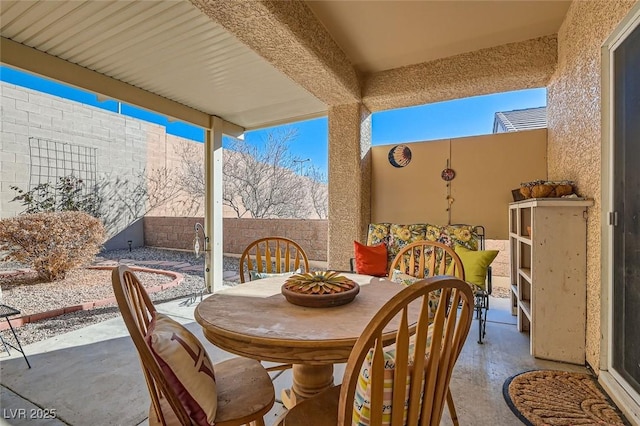 view of patio / terrace featuring outdoor dining space and a fenced backyard