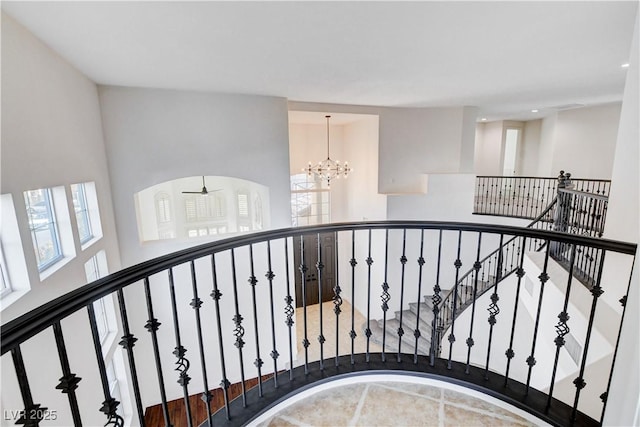 interior space featuring a chandelier and arched walkways