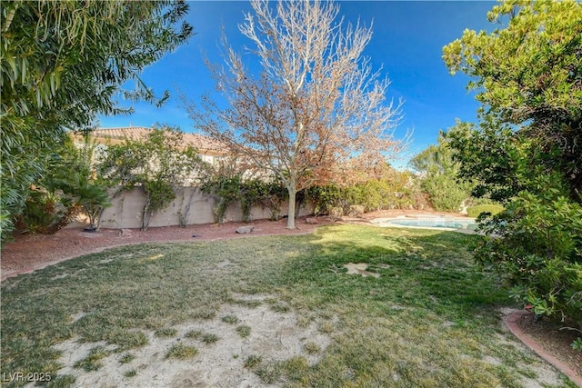 view of yard with fence