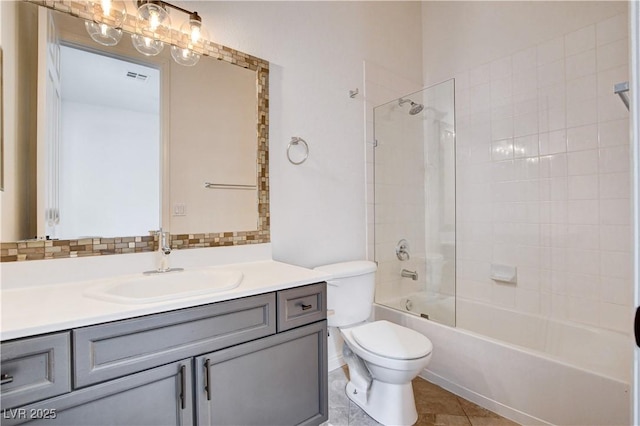 full bath featuring shower / bathtub combination, toilet, visible vents, vanity, and decorative backsplash