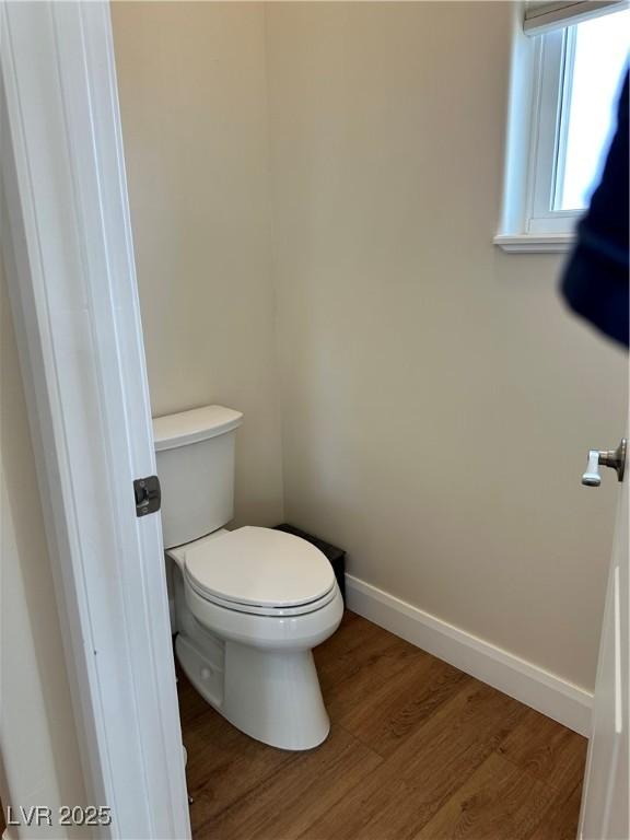 5208 Blue Desert Trl, Caliente, NV 89008 - bathroom featuring wood finished floors, toilet, and baseboards