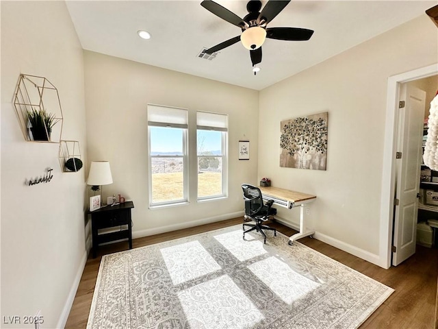 office space featuring dark wood-style floors, visible vents, baseboards, and recessed lighting