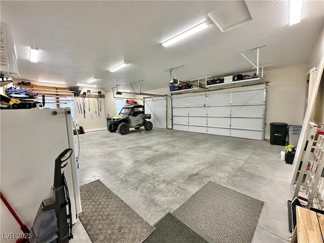 5208 Blue Desert Trl, Caliente, NV 89008 - garage with freestanding refrigerator