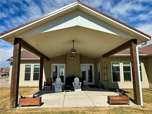 5208 Blue Desert Trl, Caliente, NV 89008 - back of property with stucco siding, a patio, a ceiling fan, and french doors