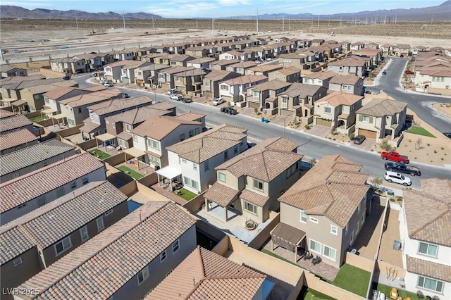 aerial view with a residential view and a mountain view