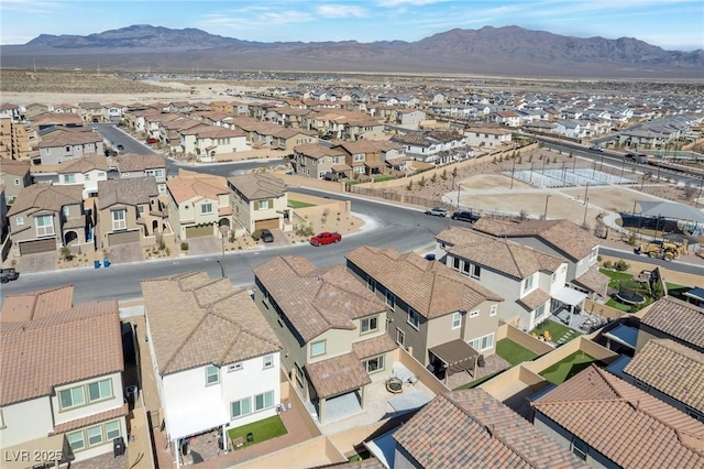 bird's eye view featuring a residential view and a mountain view