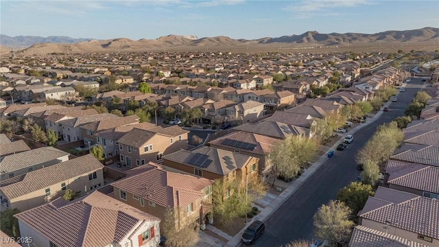 aerial view featuring a mountain view and a residential view